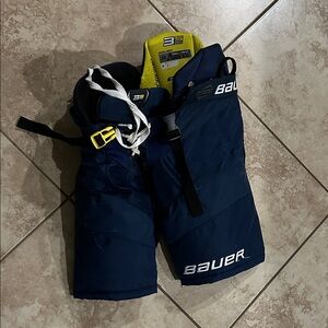 Bauer Dark Blue Hockey Pants with White and Yellow Accents